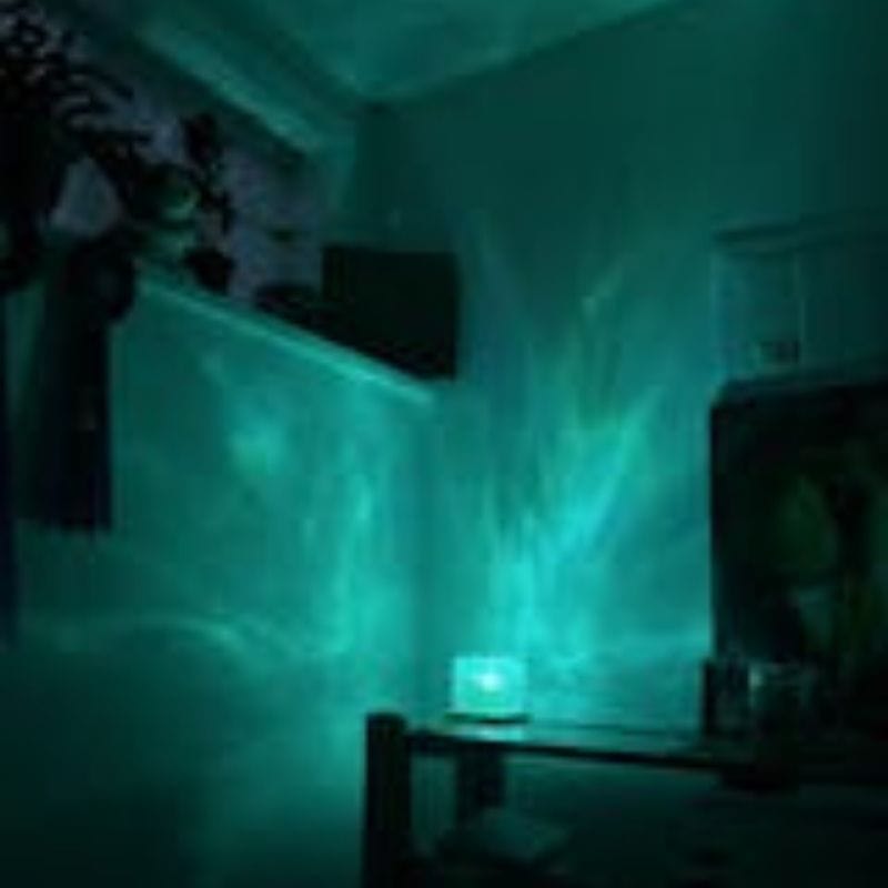 Illumea™ - Veilleuse Sous-Marine Relaxante Effet de Vagues (16 Couleurs)