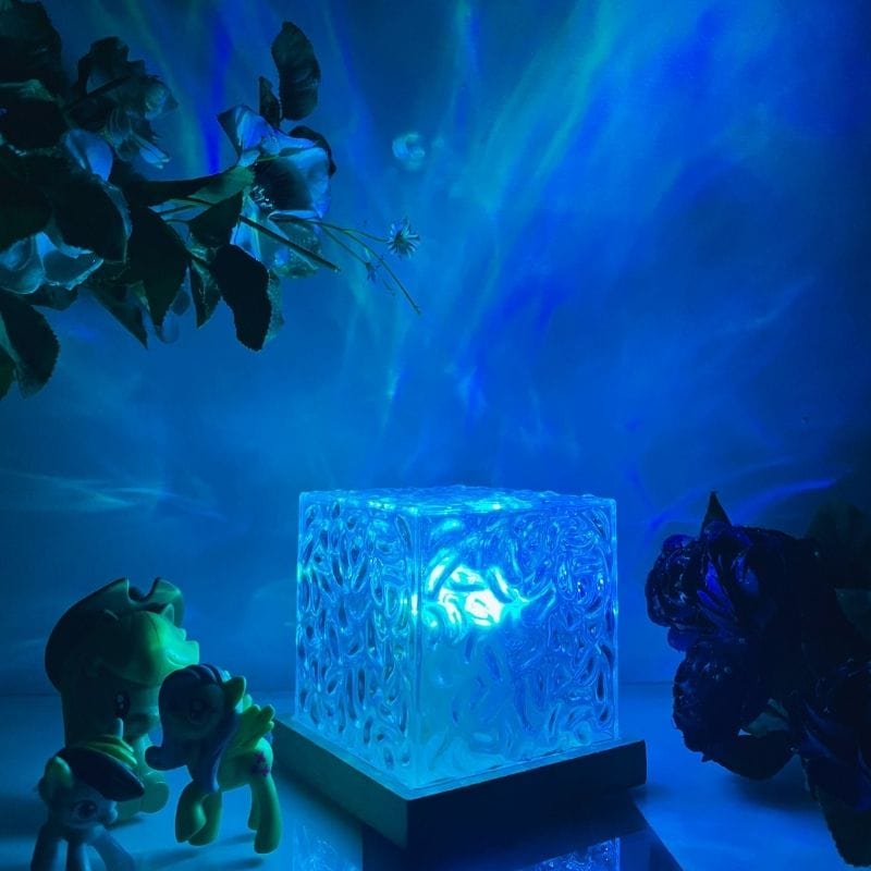 Illumea™ - Veilleuse Sous-Marine Relaxante Effet de Vagues (16 Couleurs)